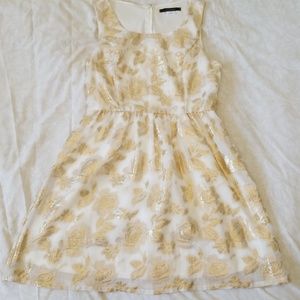 Shiny gold and white dress